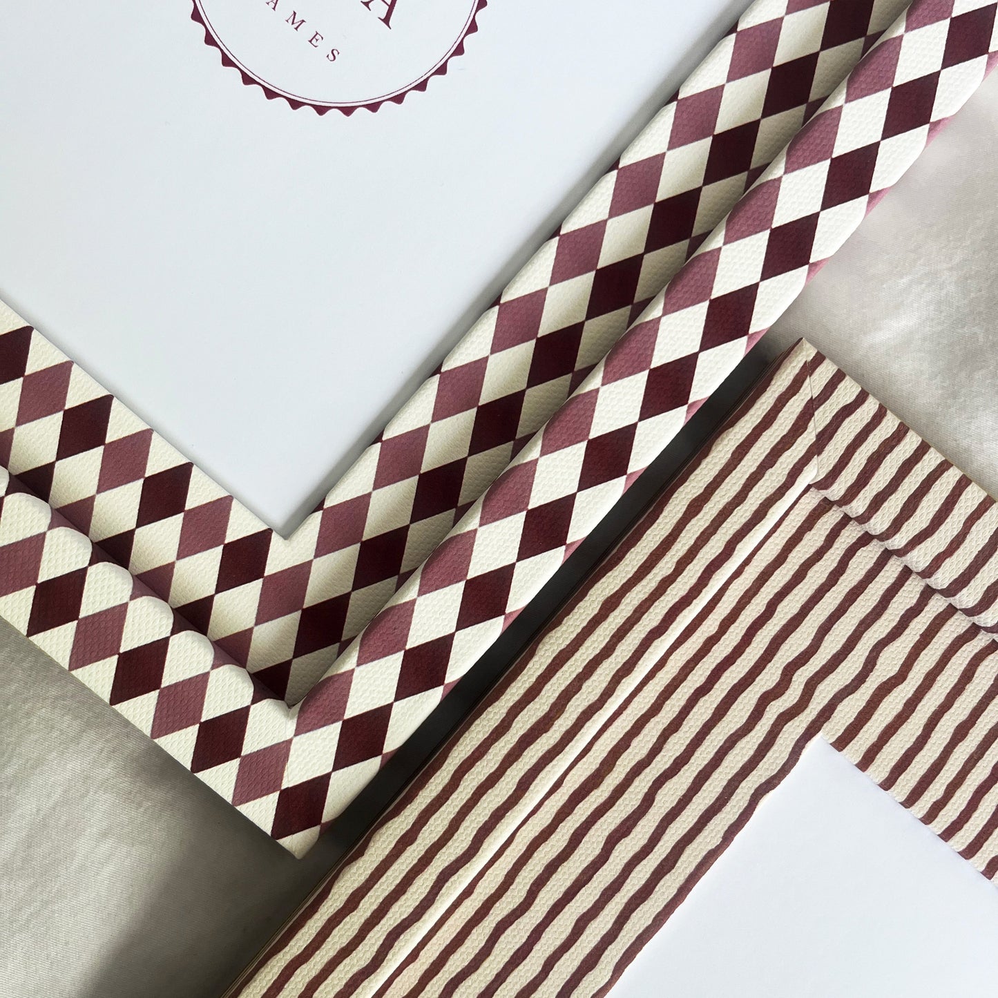 Burgundy and blush harlequin photo frame and striped fabric picture frame, showcasing different patterns