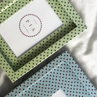 Two handmade fabric polka dot picture frames