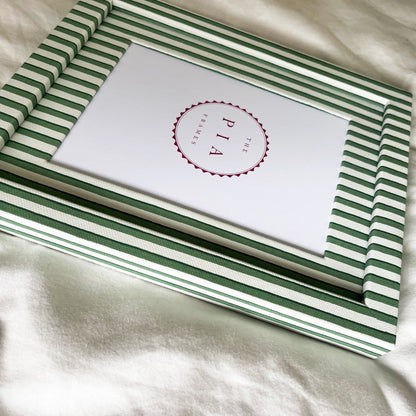 Side view of handmade green vanguard stripe picture frame, showcasing the frame’s depth and design